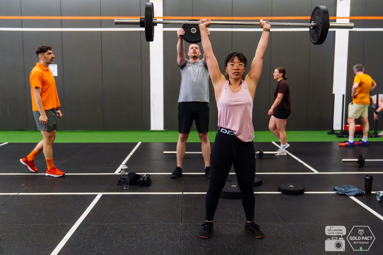 Athlete performing a squat during Functional Strength training